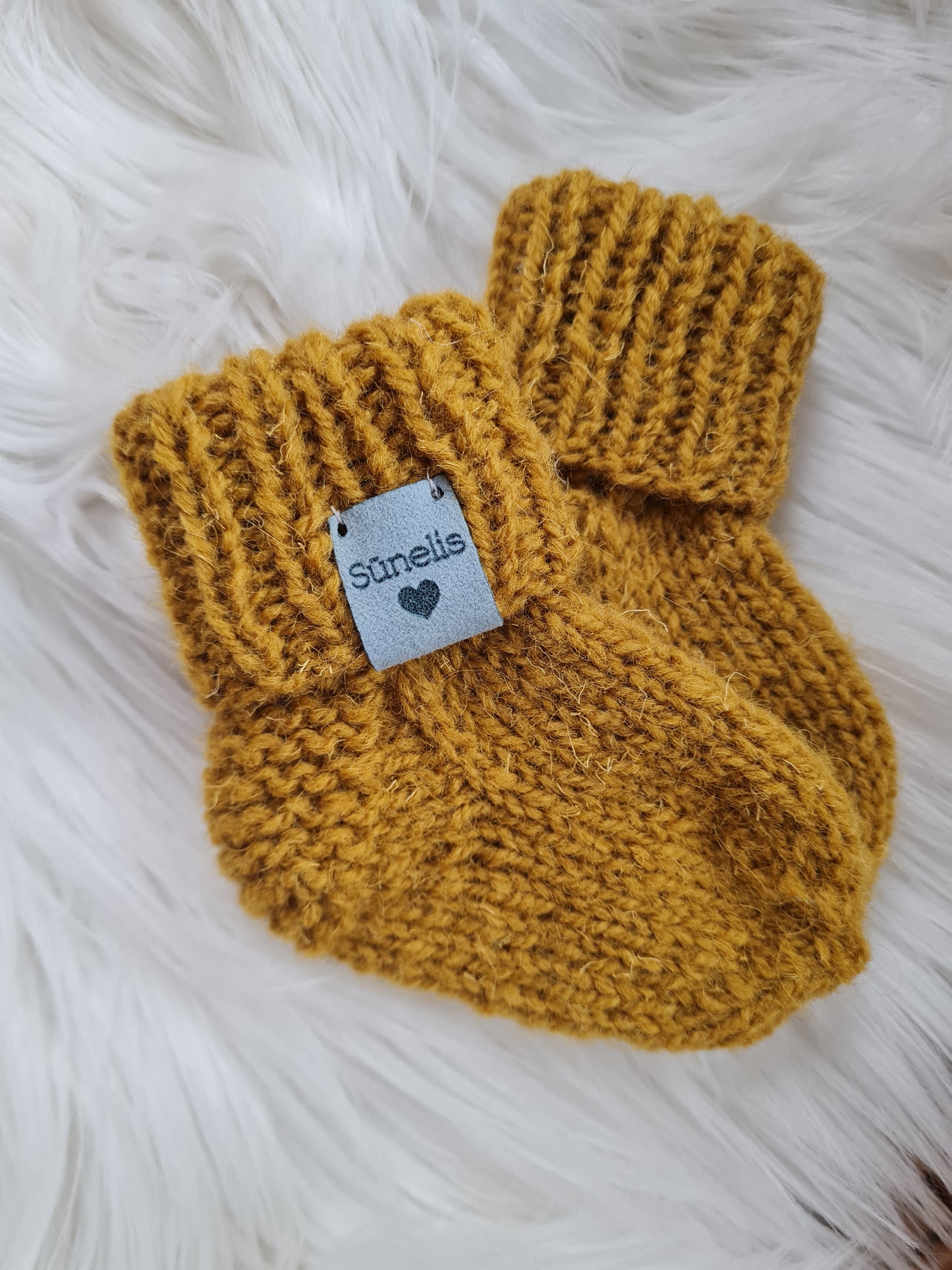 Storesnės vilnos 10 cm kojinytės